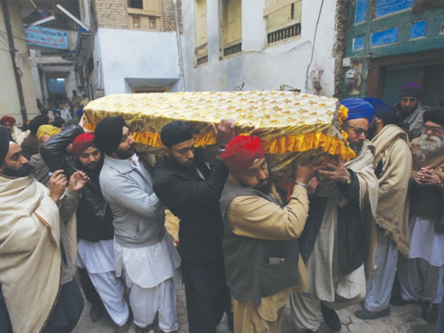 pallbearers carry mahinder singh s coffin who was the father of six he was kidnapped two months ago photo iqbal mamound express pallbearers carry mahinder singh s coffin who was the father of six he was kidnapped two months ago photo iqbal mamound express