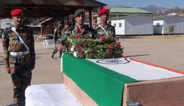indian army officers pay their respects at the coffin of soldier lans naik sudhakar singh at rajouri some 148 kms from state winter capital jammu on january 9 2013 where a post mortem will be conducted at the army hospital to confirm the extent of injuries photo afp indian army officers pay their respects at the coffin of soldier lans naik sudhakar singh at rajouri some 148 kms from state winter capital jammu on january 9 2013 where a post mortem will be conducted at the army hospital to confirm the extent of injuries photo afp