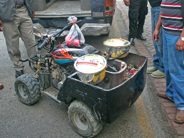 a modified four wheeler motorcycle for disabled persons two pressure cookers and nine cricket balls were among the items containing explosives which were seized by the cid officials from alleged members of ttp photo athar khan express a modified four wheeler motorcycle for disabled persons two pressure cookers and nine cricket balls were among the items containing explosives which were seized by the cid officials from alleged members of ttp photo athar khan express