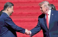 us president donald trump shakes hands with china s president xi jinping after a visit to the national archives in washington dc photo afp