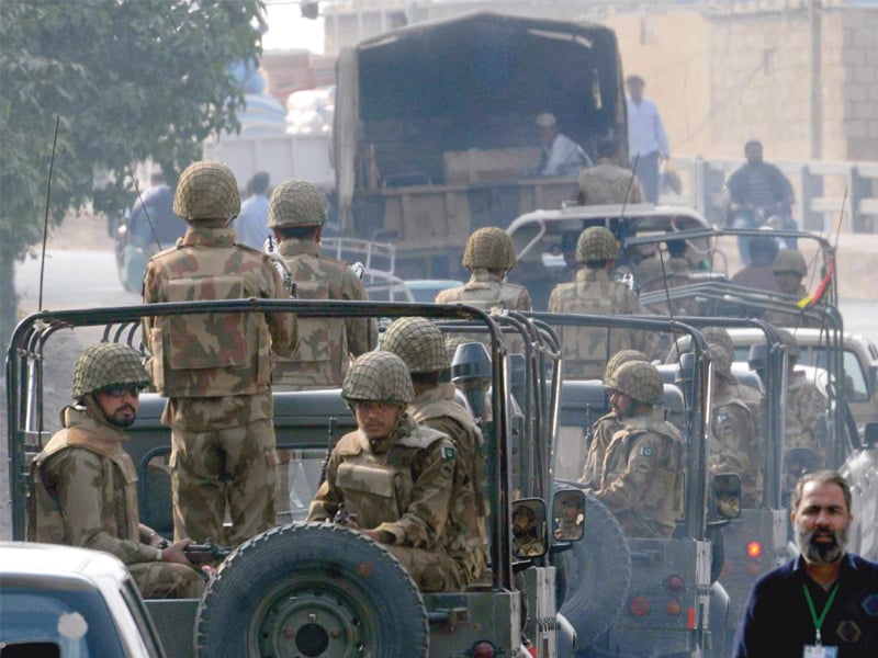 army convoy travels on club road to assist the ecp during the voter verification process photo mohammad azeem express