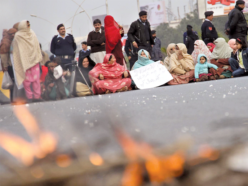 residents of the sector stage a sit in on jinnah avenue photo muhammad javaid express