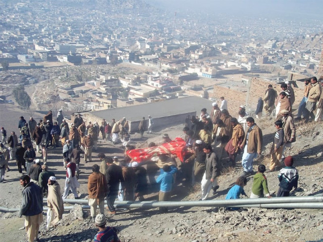 residents offer funeral prayers for a mingora blast victim on friday photo afp residents offer funeral prayers for a mingora blast victim on friday photo afp