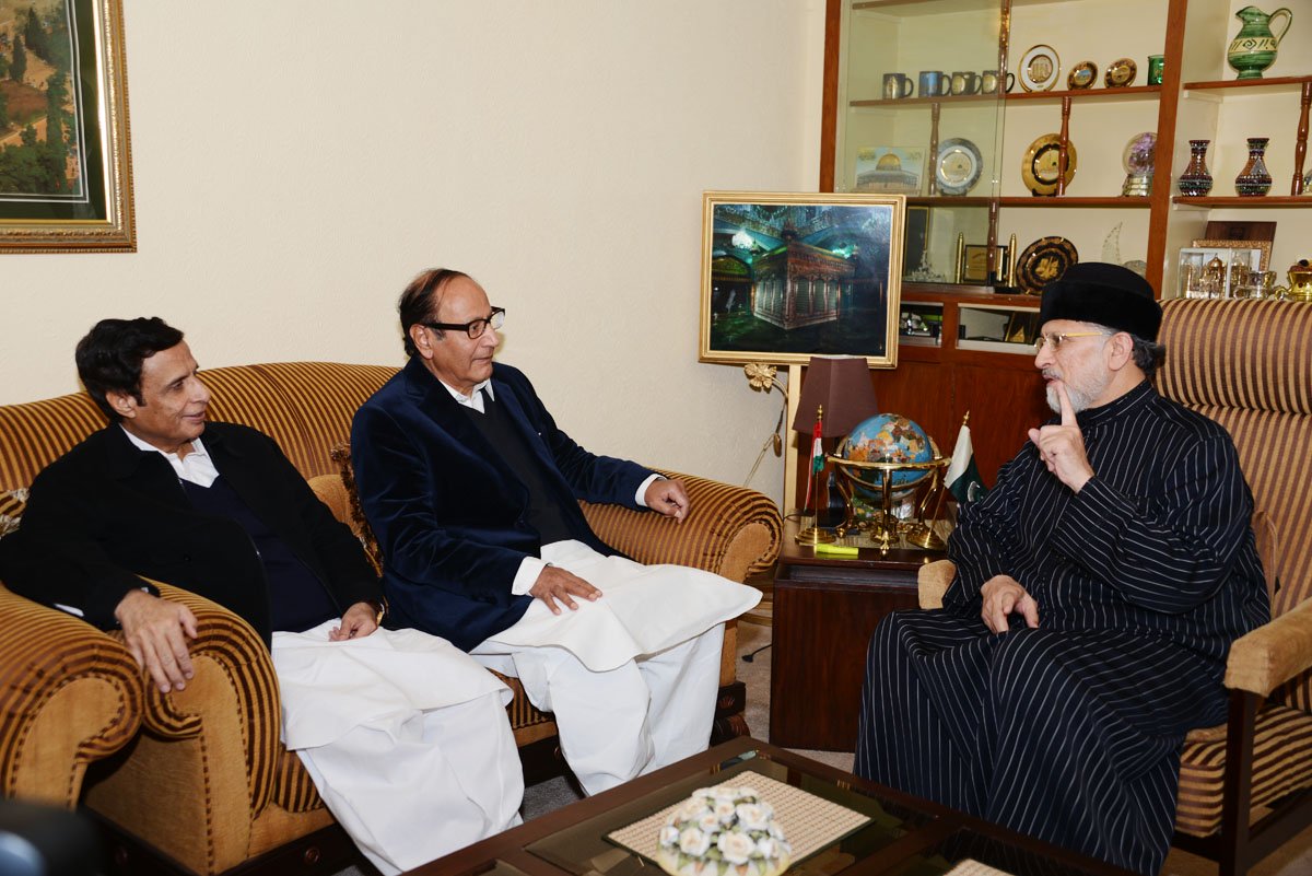 this photo released by the minhajul quran shows tahirul qadri in a meeting with pml q chief chaudhry shujaat hussain and deputy prime minister chaudhry pervez elahi on friday photo courtesy mqi file