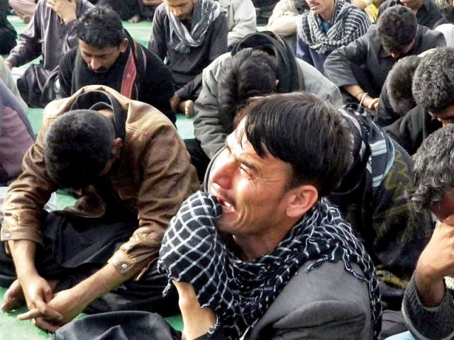 protesters weep during a sit in at hyderabad bypass protests have erupted in several cities of sindh to express solidarity with the families of victims of quetta bomb blasts photo online protesters weep during a sit in at hyderabad bypass protests have erupted in several cities of sindh to express solidarity with the families of victims of quetta bomb blasts photo online