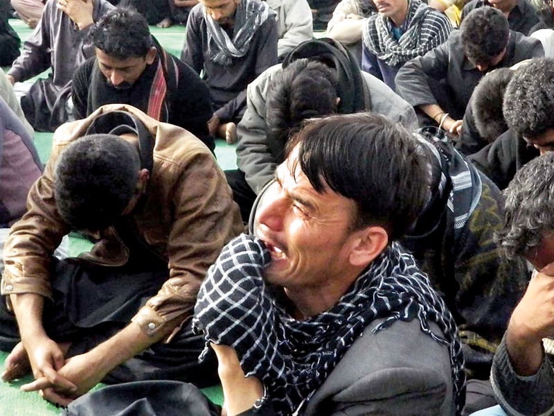 protesters weep during a sit in at hyderabad bypass protests have erupted in several cities of sindh to express solidarity with the families of victims of quetta bomb blasts photo online