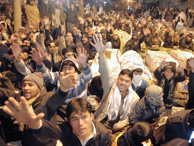 the hazara community refused to bury the victims of the quetta twin blasts in protest photo afp