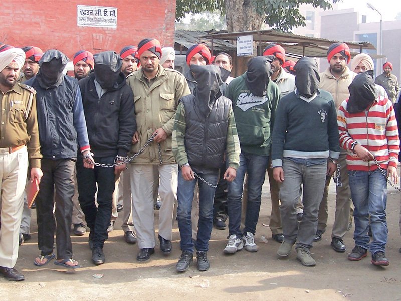 the accused are escorted by police to a court at gurdaspur photo reuters