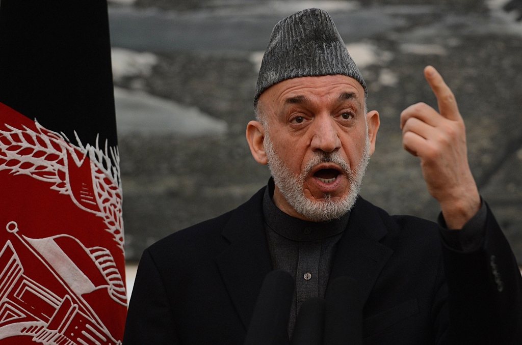 afghan president hamid karzai speaks during a news conference at the presidential palace in kabul on january 14 2013 photo afp