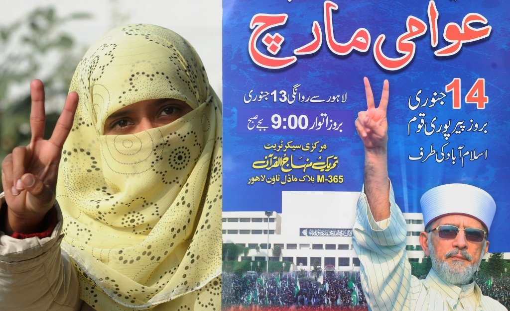 a supporter of tahirul qadri shows a victory sign at a protest march in lahore on january 13 2013 photo afp