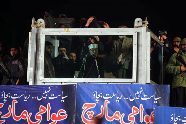 minhajul quran international chief tahirul qadri addressing the people on tuesday evening in islamabad photo zafar aslam express