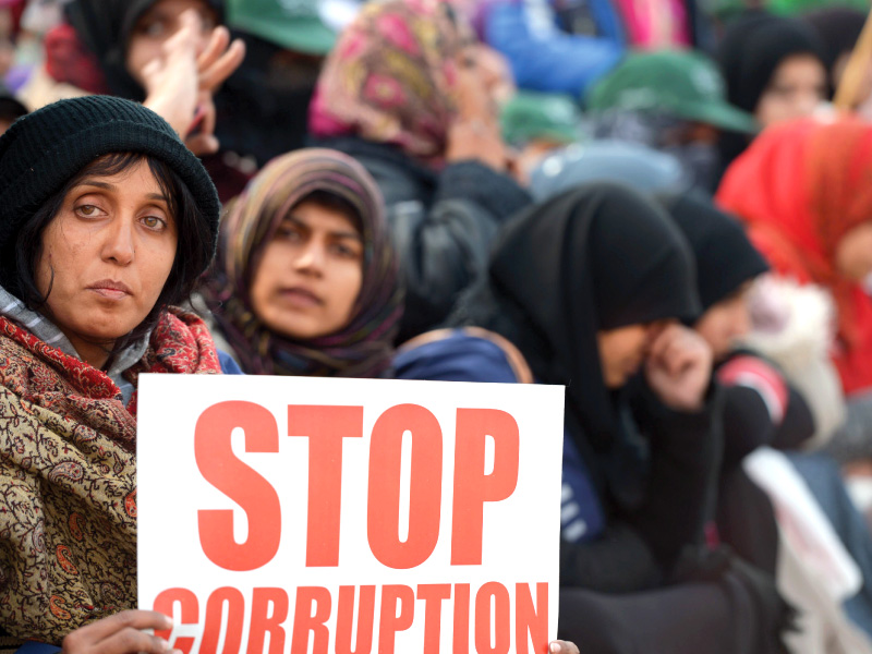 women supporters of dr tahirul qadri hold placards during the protest march in islamabad photo afp