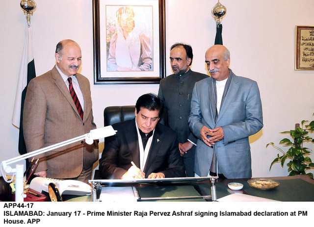 prime minister raja pervez ashraf signs the islamabad long march declaration as khurshid shah qamar zaman kaira and mushahid hussain syed look on photo app prime minister raja pervez ashraf signs the islamabad long march declaration as khurshid shah qamar zaman kaira and mushahid hussain syed look on photo app