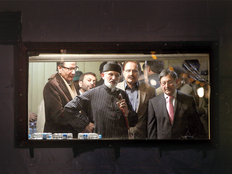 qadri announcing the end to the march photo afp file