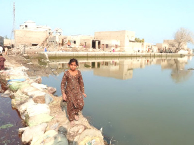 this file photo shows villages which were flooded in 2011 after a breach in jamrao canal near preetamabad this file photo shows villages which were flooded in 2011 after a breach in jamrao canal near preetamabad