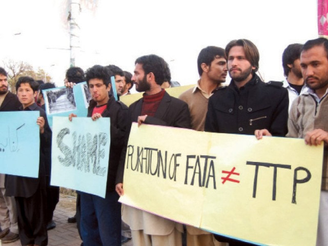 civil society activists protest killing of tribesmen in khyber agency in front of the national press club in islamabad photo muhammad javaid express civil society activists protest killing of tribesmen in khyber agency in front of the national press club in islamabad photo muhammad javaid express
