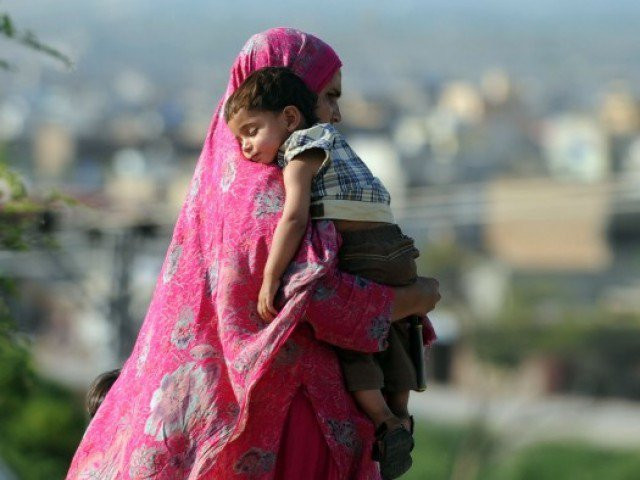 a pakistani woman carries her son as she walk on a street in islamabad on may 13 2012 on mother 039 s day photo afp a pakistani woman carries her son as she walk on a street in islamabad on may 13 2012 on mother 039 s day photo afp
