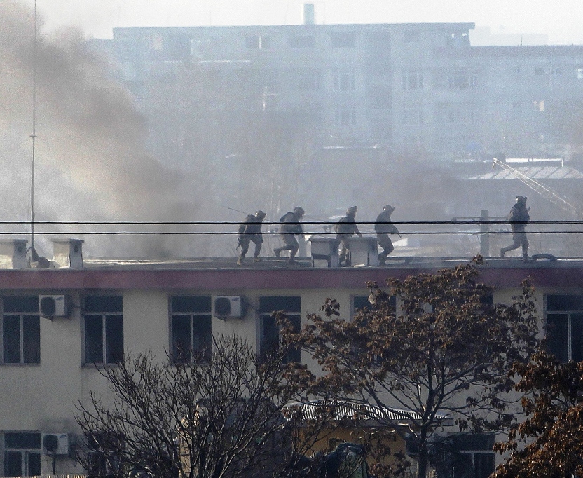 smoke rises from the building of the kabul traffic police headquarters during an insurgents 039 attack in kabul photo reuters