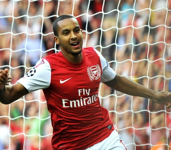 arsenal 039 s theo walcott r reacts with team mate gervinho after scoring the opening goal against udinese in their champions league first round qualifier match at emirates stadium in london august 16 2011 photo reuters file arsenal 039 s theo walcott r reacts with team mate gervinho after scoring the opening goal against udinese in their champions league first round qualifier match at emirates stadium in london august 16 2011 photo reuters file