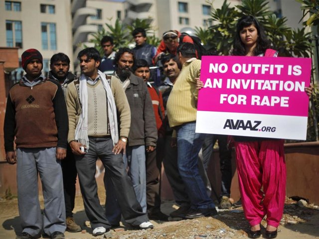 a demonstrator holds a placard during a protest outside a court in new delhi january 21 2013 photo reuters