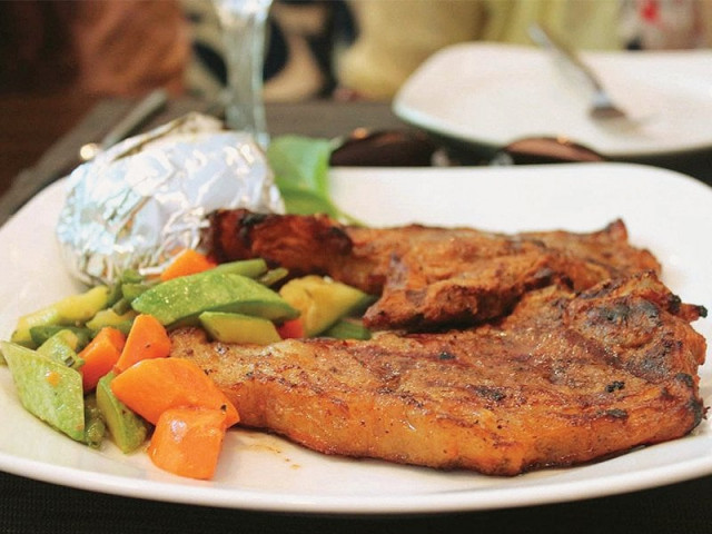 the steak came with a generous helping of fries and vegetables photo publicity the steak came with a generous helping of fries and vegetables photo publicity
