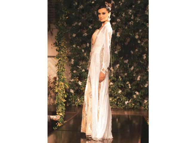 the colour palette ranged between the ivory neutrals infused with gold aqua and maroon photo shafiq malik express the colour palette ranged between the ivory neutrals infused with gold aqua and maroon photo shafiq malik express