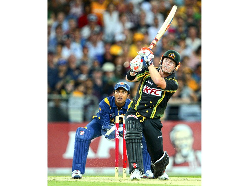 warner scored an impressive 62 ball 90 to propel australia to 137 for three in difficult batting conditions photo afp