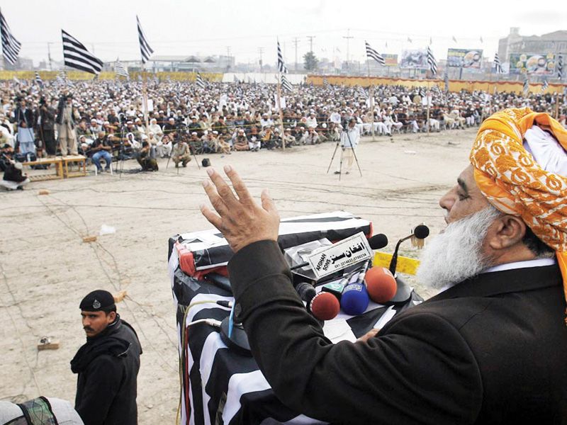 the jui f leader maulana fazlur rehman addressing a gathering in peshawar condemned the government s decision of dissolving the assemblies photo online