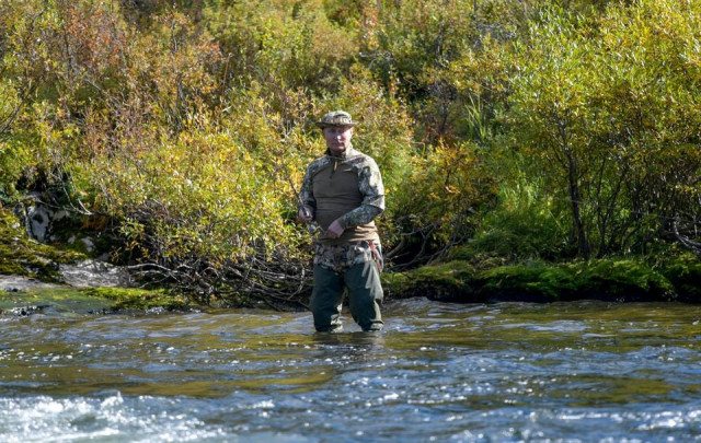 putin ends self isolation with siberian fishing trip putin ends self isolation with siberian fishing trip