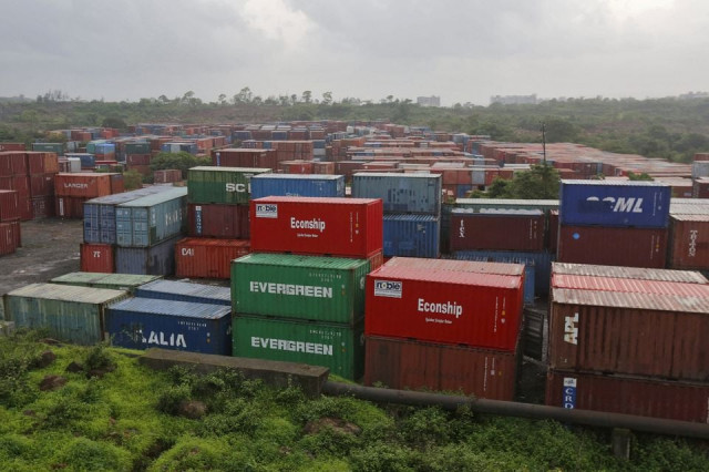 cargo containers are seen stacked outside the container terminal of jawaharlal nehru port trust jnpt in mumbai india july 15 2015 photo reuters file cargo containers are seen stacked outside the container terminal of jawaharlal nehru port trust jnpt in mumbai india july 15 2015 photo reuters file