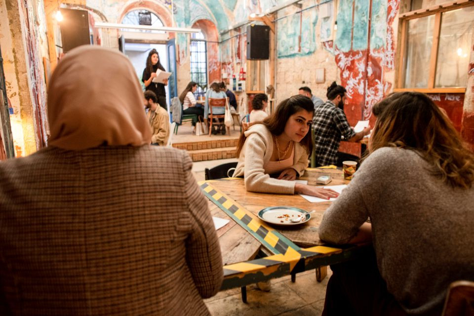 palestinians chat with israelis during a language exchange program modelled on speed dating in jerusalem october 27 2021 photo reuters
