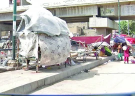 flood displaced families take shelter on sidewalks flood displaced families take shelter on sidewalks