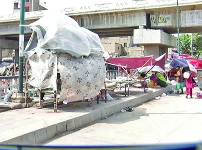 flood displaced families take shelter on sidewalks flood displaced families take shelter on sidewalks