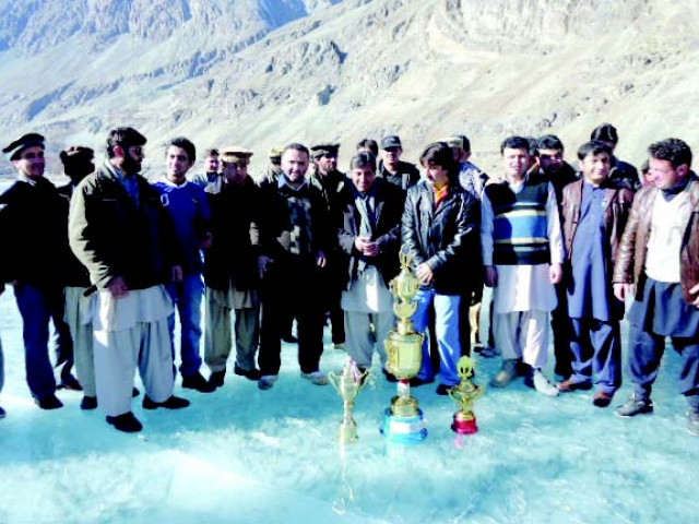 both teams stand with their trophies on the beautiful khalti lake photo feroz khan both teams stand with their trophies on the beautiful khalti lake photo feroz khan