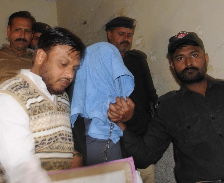 file photo of ajmal pahari being brought in for a hearing photo irfan ali