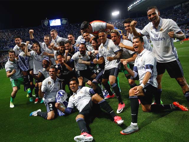 real madrid celebrate after winning la liga at the la rosaleda stadium in malaga photo reuters