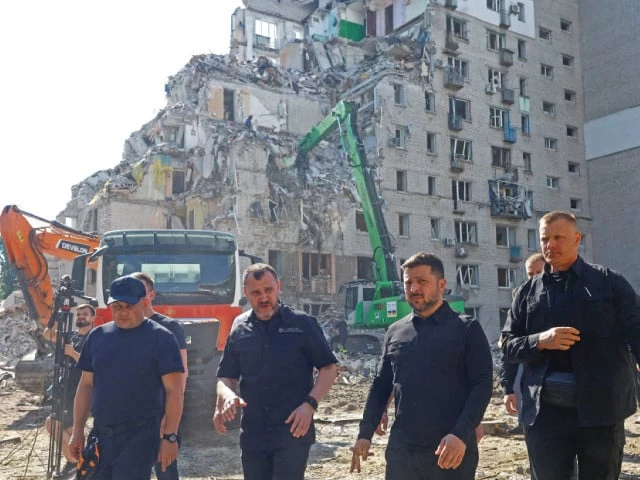 ukraine s president volodymyr zelenskiy visits the site of a damaged apartment building in kyiv photo reuters ukraine s president volodymyr zelenskiy visits the site of a damaged apartment building in kyiv photo reuters