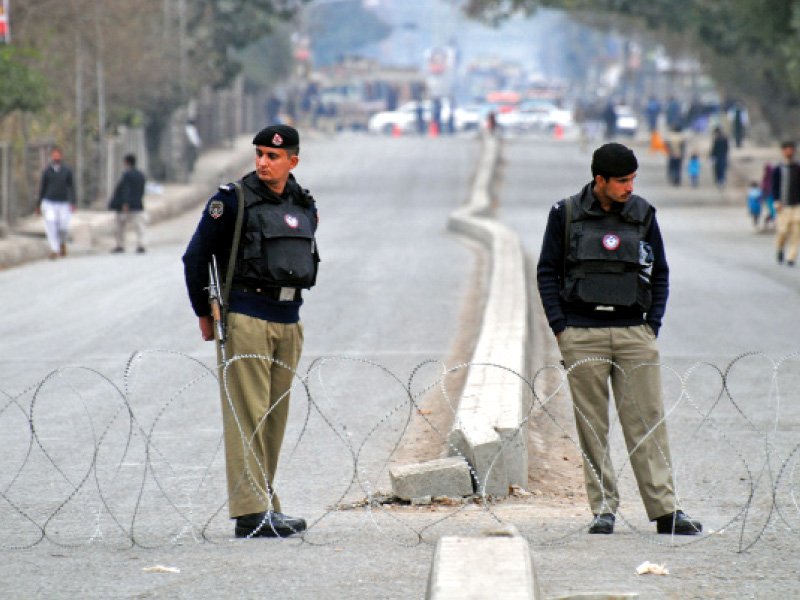 police stand guard on the main routes leading to the governor house photo muhammad iqbal express