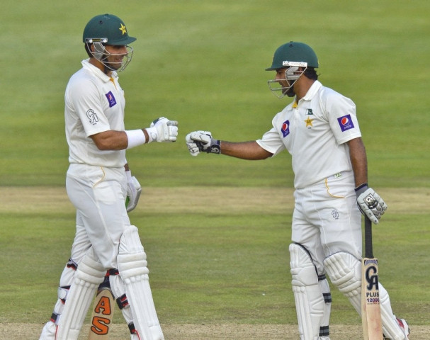 asad shafiq and misbah ul haq celebrate their 100 partnership on day three of the first test match between south africa and pakistan in johannesburg at wanderers stadium on february 3 2013 photo afp asad shafiq and misbah ul haq celebrate their 100 partnership on day three of the first test match between south africa and pakistan in johannesburg at wanderers stadium on february 3 2013 photo afp