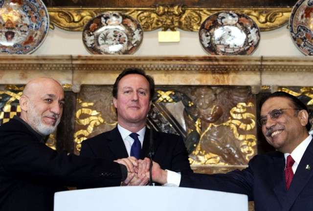 britain 039 s prime minister david cameron c shakes hands with afghan president hamid karzai l and pakistani president asif ali zardari r at chequers the prime minister 039 s official country residence near aylesbury in buckinghamshire west of london on february 4 2013 photo afp britain 039 s prime minister david cameron c shakes hands with afghan president hamid karzai l and pakistani president asif ali zardari r at chequers the prime minister 039 s official country residence near aylesbury in buckinghamshire west of london on february 4 2013 photo afp