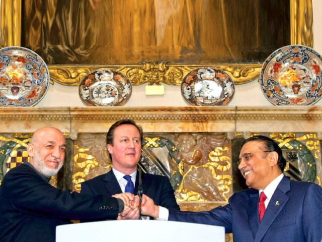president asif ali zardari stands alongside the british premier and afghan president at chequers pm cameron s official country residence west of london photo afp president asif ali zardari stands alongside the british premier and afghan president at chequers pm cameron s official country residence west of london photo afp