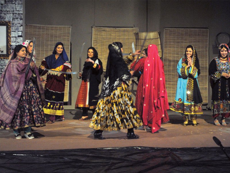 actors perform the traditional khattak dance songs dedicated to the poet s life were periodically played in the background photo muhammad iqbal express