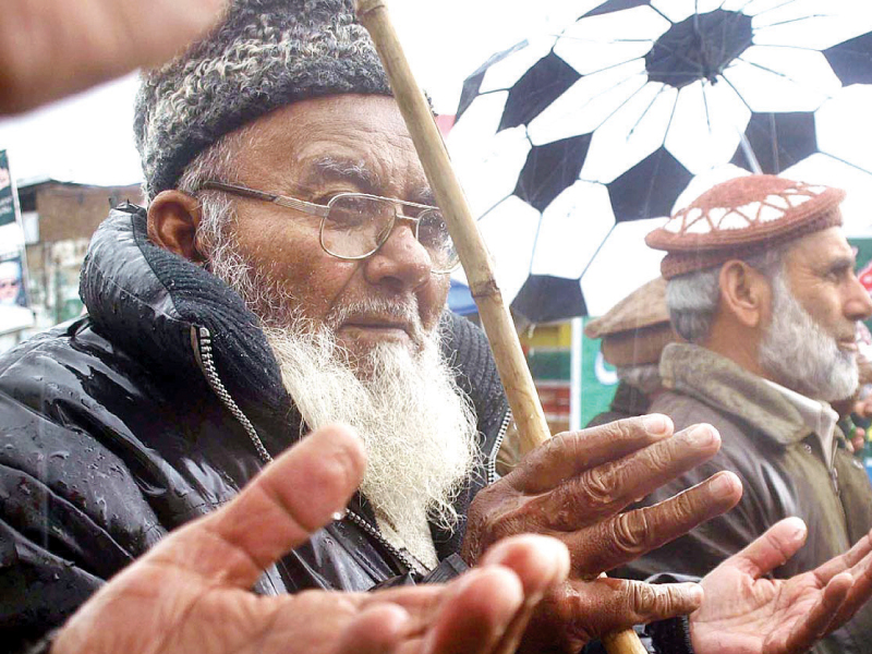 elderly persons take part in a rally to mark kashmir solidarity day in islamabad photo app