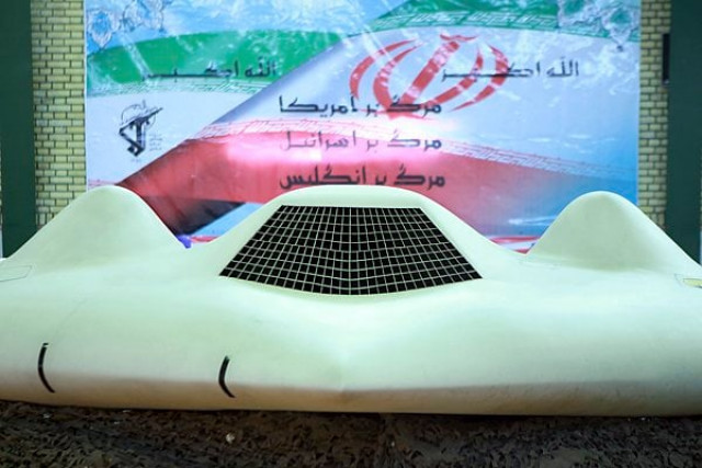 a us rq 170 unmanned spy plane displayed in front of a iranian flag with persian script that reads quot down with the us down with israel and down with britain quot at an unknown location in undated picture received december 8 2011 photo reuters file a us rq 170 unmanned spy plane displayed in front of a iranian flag with persian script that reads quot down with the us down with israel and down with britain quot at an unknown location in undated picture received december 8 2011 photo reuters file