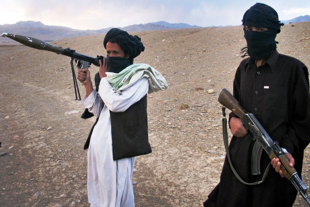 in this photograph taken on september 26 2008 taliban members stand on a hillside in kabul photo afp file