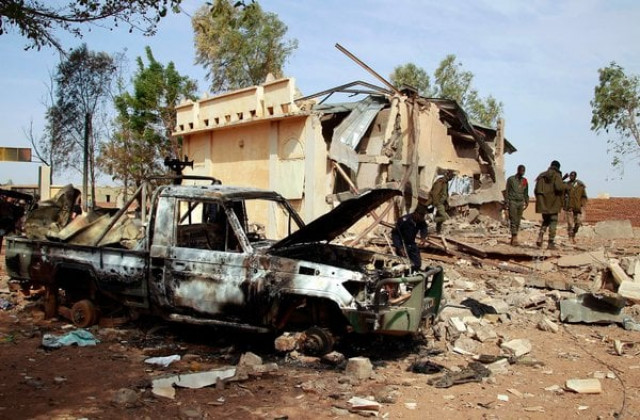 a photo of charred pickup truck which was overrun by rebels before the french unleashed airstrikes photo reuters a photo of charred pickup truck which was overrun by rebels before the french unleashed airstrikes photo reuters