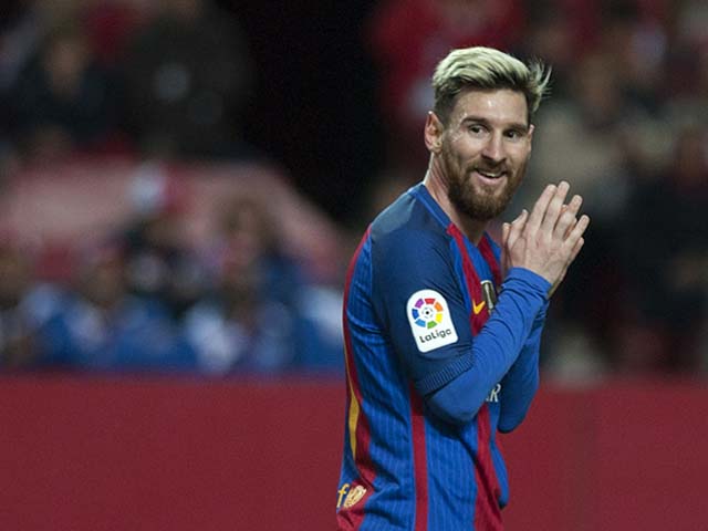 barcelona 039 s argentinian forward lionel messi looks on during the spanish league football match sevilla fc vs fc barcelona photo afp