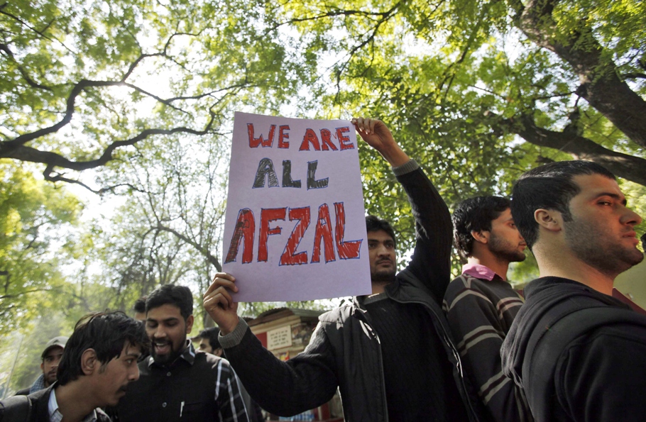 a demonstrator holds a placard during a protest to condemn the hanging of mohammad afzal guru in new delhi february 9 2013 photo reuters