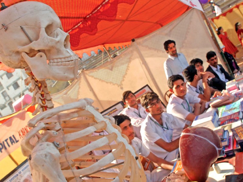 several students of schools colleges and universities participated in lyari resource centre s education fair held at kakri ground on saturday students displayed models of solar systems human skeletons wind turbines etc as proud parents admired their works photo athar khan express