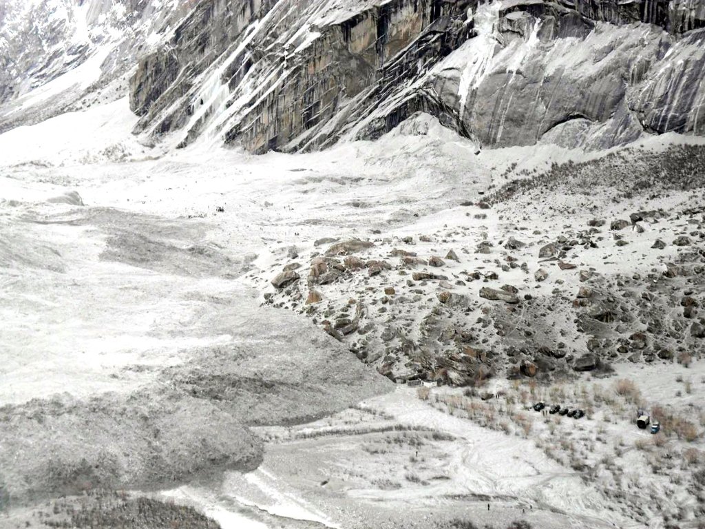 file photo shows an aerial view of troops searching for avalanche victims including 124 soldiers during a rescue operation on the siachen glacier mountains photo afp file